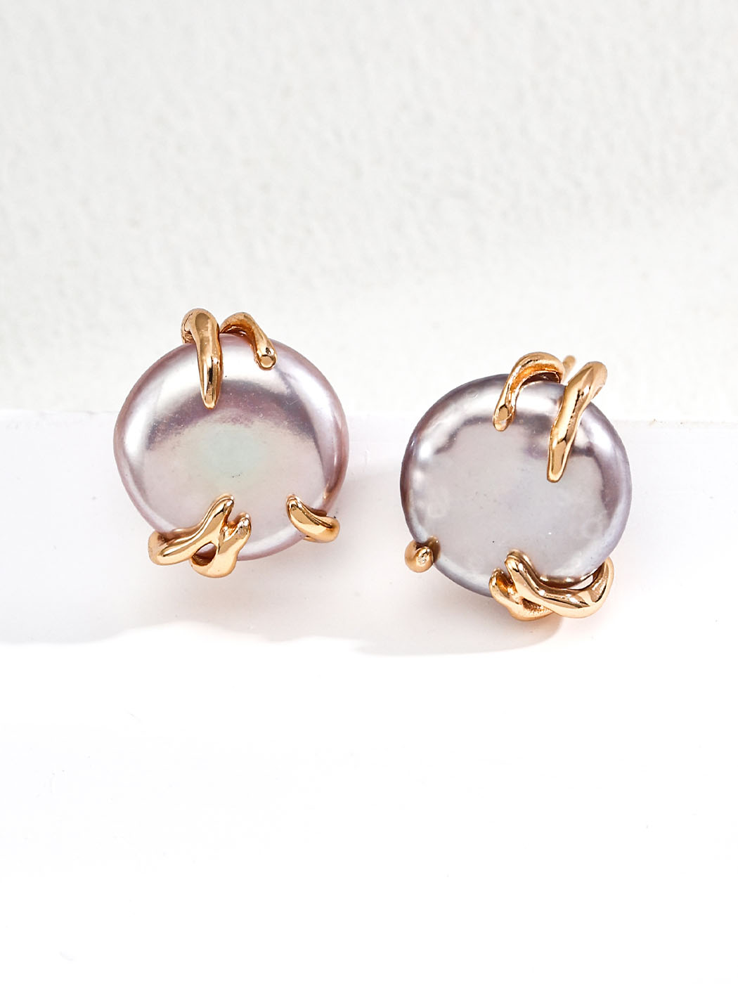 Molten Embrace Pearl Studs in Sterling Silver